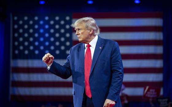 Former President Donald Trump pumps his fist as he departs after speaking at the Conservative Political Action Conference on March 4, 2023, at National Harbor in Oxon Hill, Maryland. (RNS/AP/Alex Brandon)